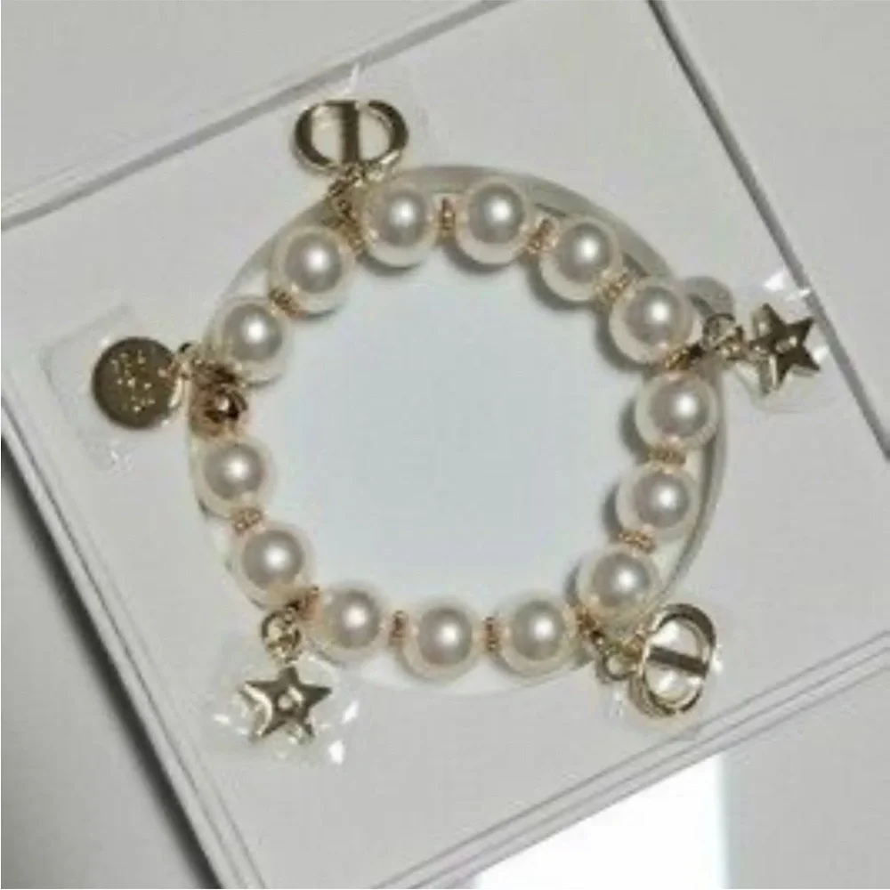 Dior Bundle: Dior Bracelet NIB and Addict Lip Glow Oil #062 Bronzed Glow - Picture 3 of 9